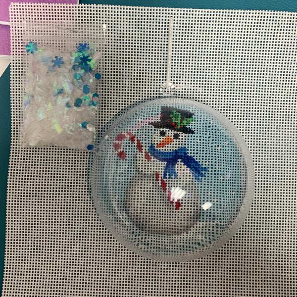 Clear dome and confettI-snowman with candy cane
